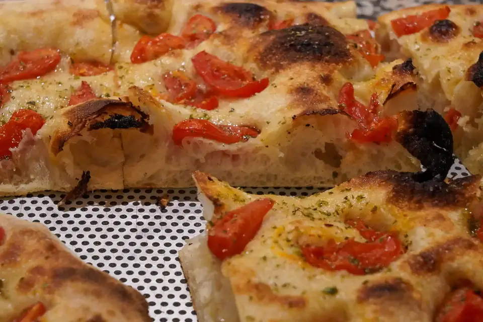 Pizza al taglio with cherry tomatoes